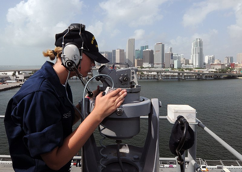 File:US Navy 100721-N-3265K-066 Quartermaster Seaman Apprentice Katie A. Seavey uses a telescopic alidade to find navigation aides while pulling away from the port of Miami aboard the multi-purpose amphibious assault ship USS IWO JI.jpg