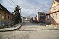 Čeština: Západní pohled do ulice B. Němcové v Okříškách, okr. Třebíč. English: West view of B. Němcové street in Okříšky, Třebíč District.