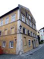 Stately, free-standing building facing the streets, former brewery inn