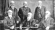 Thumbnail for File:1918 Russell &amp; Co. catalog. Russell Brothers. Seated, from left Joseph, Nahum and Clement; standing are Thomas, George and Allen.jpg