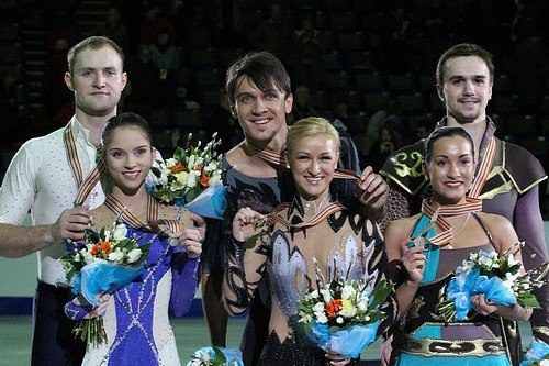 The 2012 medalists in the pair skating event