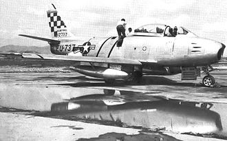 Squadron F-86E Sabre at Mangun AB 25th Fighter-Interceptor Squadron North American F-86E-10-NA Sabre 51-2737.jpg