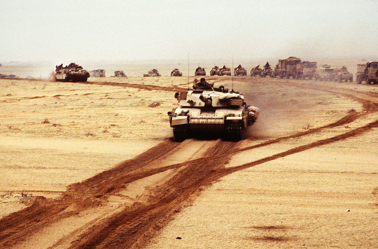A British Challenger 1 main battle tank moves along with other Allied armor during Operation Desert Storm.