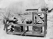 A synchronized Vickers gun fitted to a test stand; an electric motor drives a structure that simulates the propeller Aerial Warfare 1914-1918 Q66257.jpg