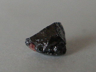 <span class="mw-page-title-main">Armalcolite</span> Oxide mineral