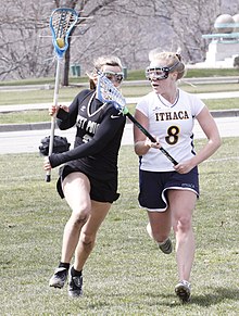 A women's lacrosse game between the Ithaca Bombers and Army Black Knights in 2011 Army vs. Ithaca women's lacrosse (5588575649).jpg