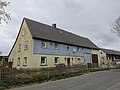 Residential stable house with integrated barn