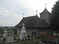 Biserica pe latura nord-vestică