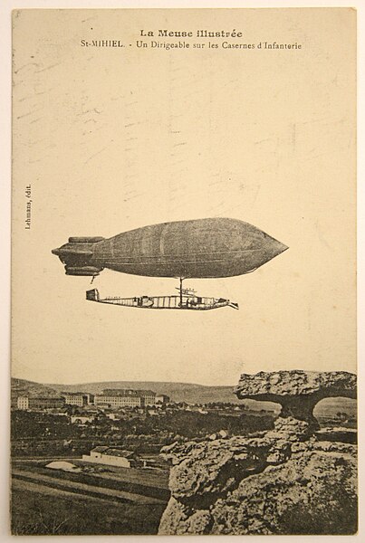 File:Blimp with airplane.jpg