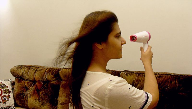 File:Blow-drying hair.jpg