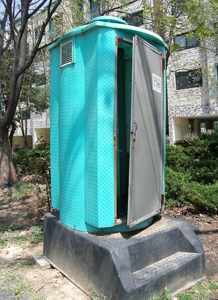 File:Blue streetside toilet in the city.jpg