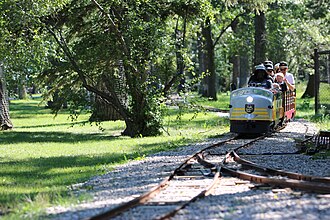 The ridable miniature railway operates in summer months. Bowness Park miniature railway in 2016.jpg