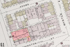 A map of the Brooklyn Theatre block, 1887, from the Sanborn insurance maps of Brooklyn (Volume 2, Plate 40). By 1887, the original theatre had been razed and a second theatre rose in its place, occupying the same L-shaped lot once held by the original building. The interior arrangement of this 'new' Brooklyn Theatre was wholly unlike the original structure, however: the stage and main entrances swapped positions, as did the stage and lobby. The block was still organized very much like it had been in late 1875, but would soon change in June 1890 when the second theatre and the old Clarendon Hotel were razed to make way for the Brooklyn Daily Eagle. Brooklyn Theatre Lot Sanborn Map Detail.png