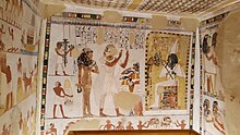 Damaged depiction of Menna before Osiris in his tomb By ovedc - Tomb of Menna - 10.jpg
