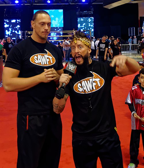 Amore (right) with Colin Cassady at WrestleMania Axxess in March 2015