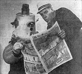 Toby the Robot (Charlie Folds) and Charlie Baxter, co-hosts of Charlie Reads the Comics. Charlie Reads the Comics.jpg