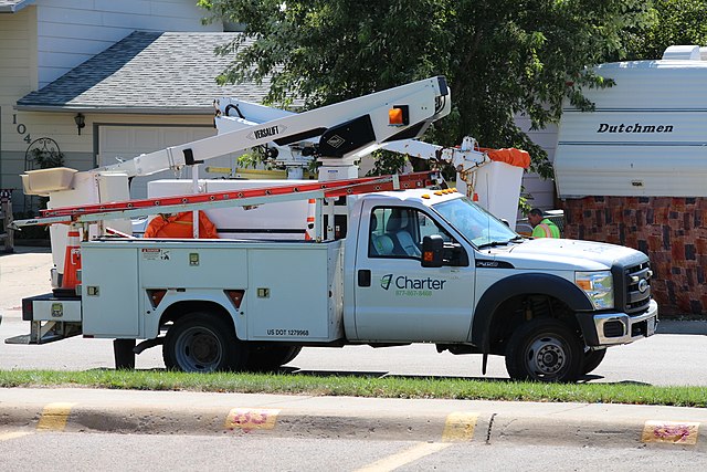 A Charter Communications-branded Versalift Ford F-450 Super Duty bucket truck in Gillette, Wyoming