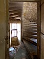 The chateau's main stairwell spirals up three stories high, built of a self-supporting staircase inside the tower