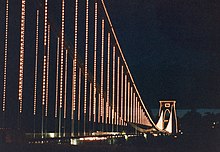 The bridge illuminated; these lights have since been replaced with LEDs CliftonSupensionLit.jpg