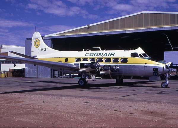 A Connair DH-114 at Alice Springs, early 1970s