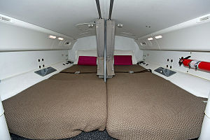 While one crew is flying, the other crew may rest in a crew rest area, such as this one on a Boeing 787 Crew rest on a Boeing 787.jpg