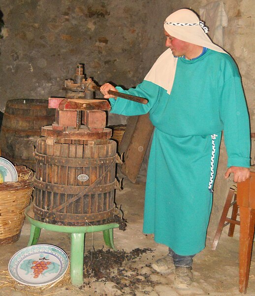 File:Demonstration of basket Wine pressing.jpg