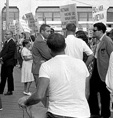 Demonstrators against the Vietnam War holding signs on the boardwalk during the 1964 Democratic National Convention Demonstrators against the war in Vietnam holding signs on the boardwalk during the 1964 Democratic National Convention (cropped1).jpg