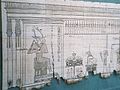 Antički papirus. Prikazuje boga Ozirisa i merenje srca.