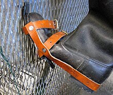 Boot modified with metal hooks to enable the wearer to climb the border fence Escape boot.jpg