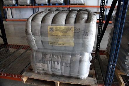 Softgoods strapped in a bale or bundle