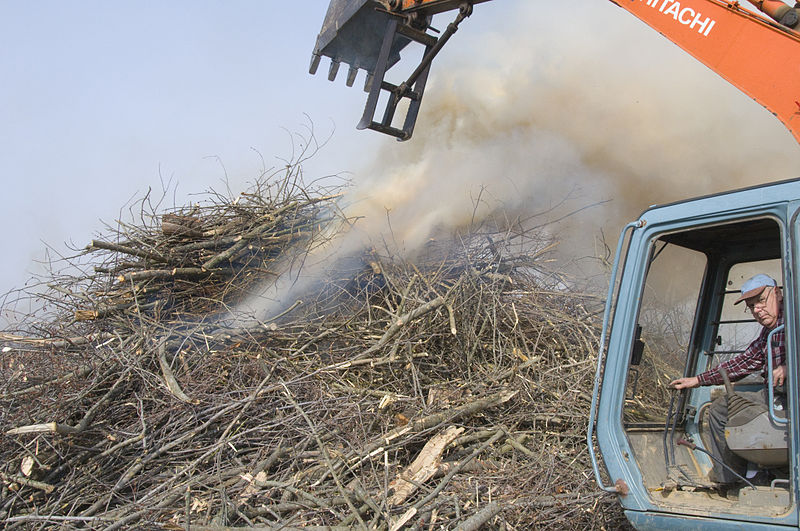 File:FEMA - 40021 - Equipment operator working on a smoking debris pile in Kentucky.jpg