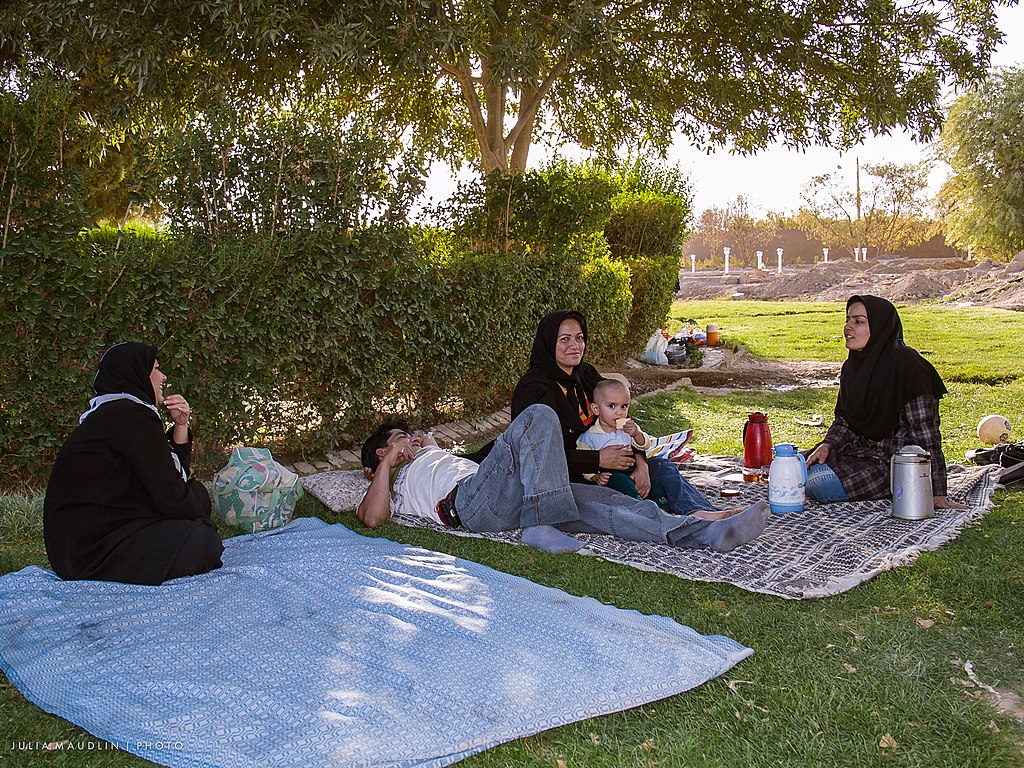 File:Family Picnic in the shade of a 4000-year-old cypress tree near Abarqu, Iran (14473884334).jpg - Wikimedia Commons