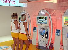 People spending their leisure time playing computer games Gamescom 2009 - Wii (5206).jpg