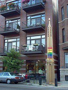 A rainbow pylon on North Halsted Street at West Cornelia Avenue, like others along the Legacy Walk on Halsted street, welcomes visitors to the landmark gay village. Gerald Farinas Boystown Rainbow Pylon.jpg