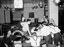 The Globe and Mail staff await news of the D-Day invasion. June 6, 1944. Globe and Mail staff wait for news.jpg