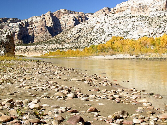The Green River flows through Split Mountain Canyon before leaving Dinosaur National Monument in a meandering path across a broad irrigated flood plai