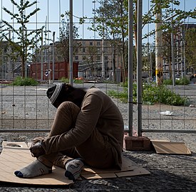 Homeless man at Piazza Garibaldi, Naples, Italy