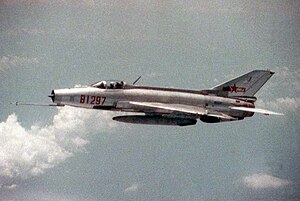 In flight air-to-air left front view of a People's Republic of China (PRC) F-7-III fighter aircraft - DPLA - 517e76bcff9eceda272826e0d82a5b50.jpeg