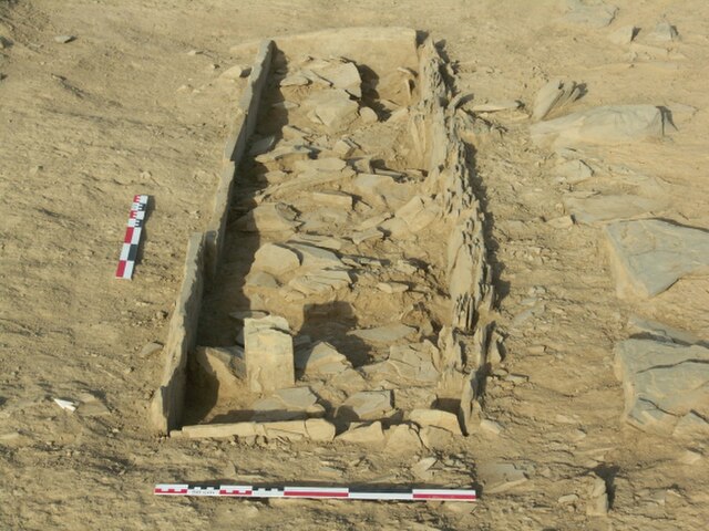 Individual burial from the Column Tomb with isolated stele placed at the head