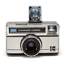 Instamatic 277-X, a later model with a "Magicube" flashbulb cartridge attached Kodak Instamatic 277 X - 4 - with Magicube (retouch).jpg