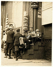 Newsboys congregating on a stoop, 1910 Lewis Hine, Newsboys on a stoop, Wilmington, Delaware, 1910.jpg