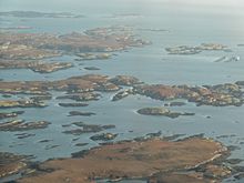 Islands in Loch Uisgebhagh. Bearran is at top right, Orasaigh, middle right and the peninsula of Meanais at top left. Eilean nan Each, Maragaidh Beag and Maragaidh Mòr are in the distance.