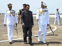 Maharashtra Governor C. Vidyasagar Rao, accompanied by Vice Admiral SPS Cheema, on his way out to visit the Headquarters of the Western Naval Command.jpg