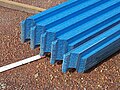 Roll-formed metal roof purlins, also called roof battens. They are cropped to the angle of the purlin top cuts and can be lapped for joining.