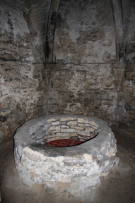 The 13th-century well inside the 11th-century motte OxfordCastle MotteWell.jpg
