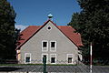 Bývalá škola v Přebytku (dům čp. 248 v Ludvíkově pod Smrkem).
