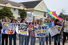 Pro-LGBT students in New Brunswick, Canada conducting a walkout protest against parental rights movement induced changes to the province's Sexual Orientation and Gender Identity policy. Policy 713 Walkout Signs.jpg