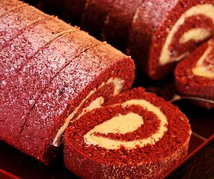 A home-made red velvet Swiss roll with buttercream filling