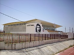 The multi purpose building of Marinaleda, also used as town hall, adorned with a portrait of Ernesto Che Guevara