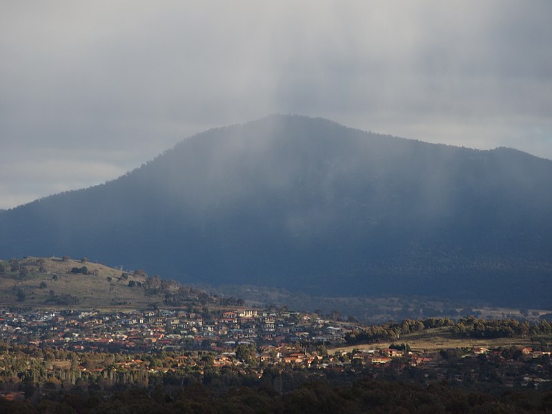 File:Snow falling on Mount Tennent July 2013.jpg